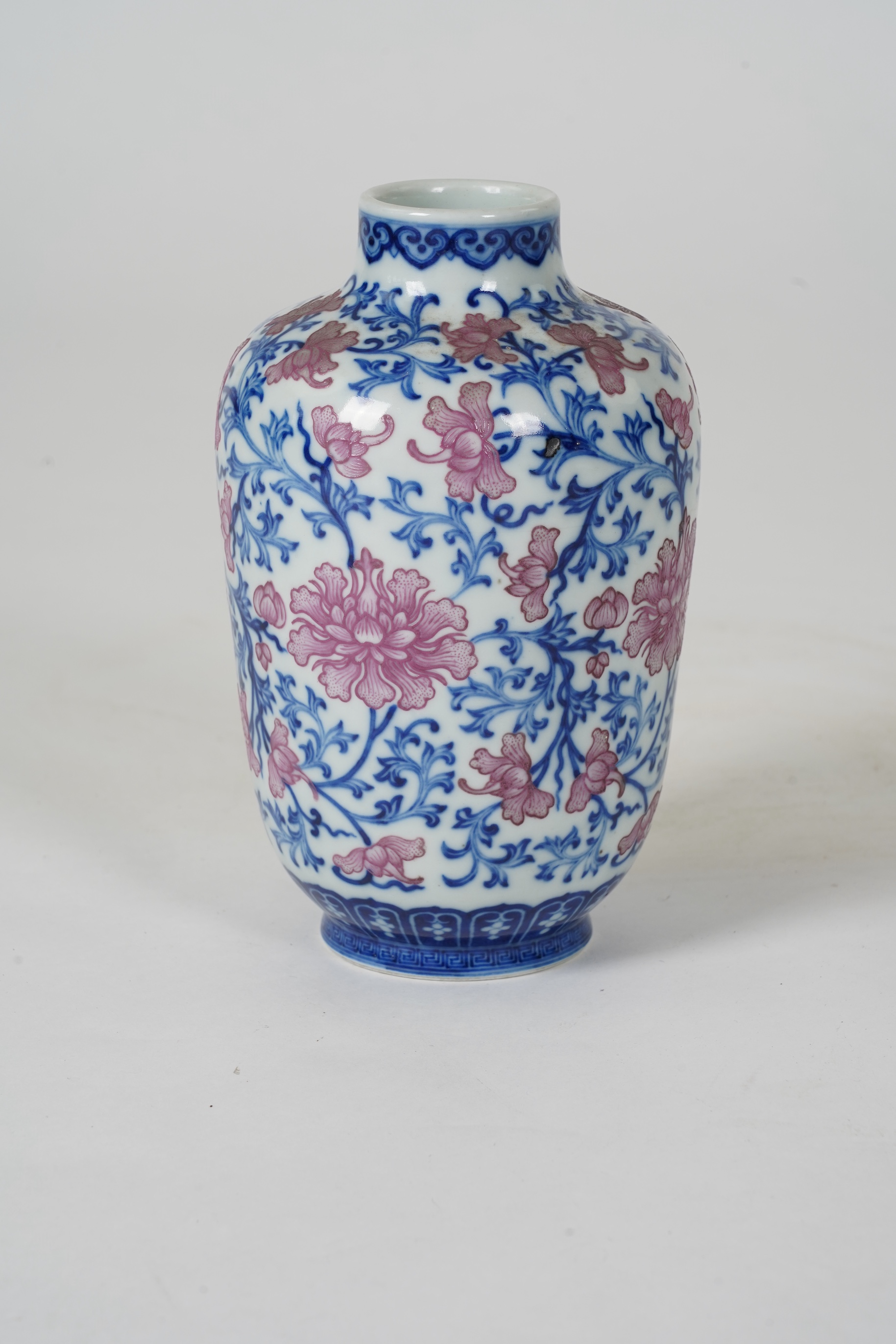 A Chinese pink enamelled and underglaze blue vase, six character Qianlong seal mark to base, possibly Republic period